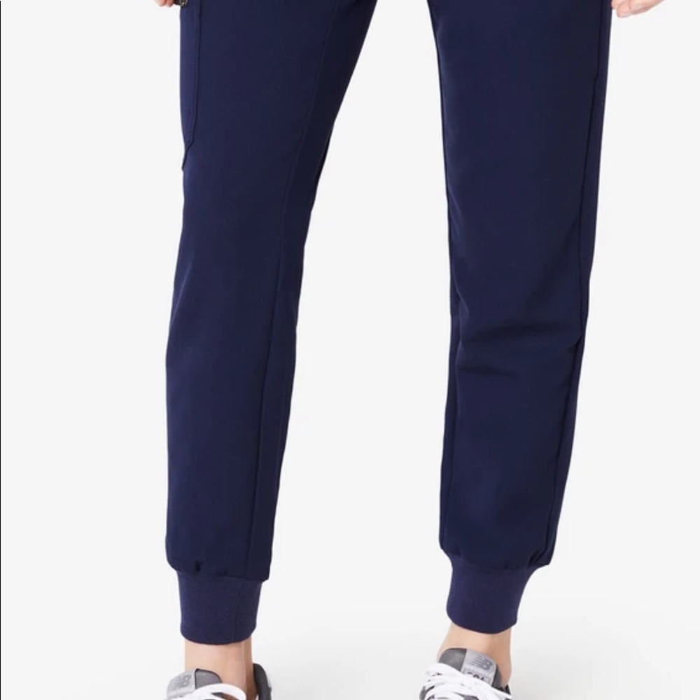 Navy blue FIGS scrub bottoms.